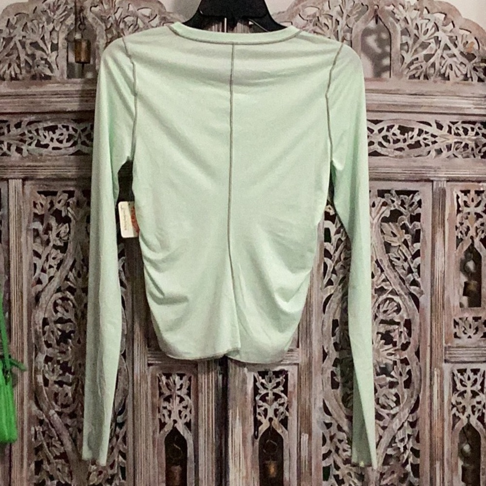 FP MOVEMENT Right On Run Long Sleeve Layer Top Thumbholes NWT Pistachio Green - Picture 6 of 7